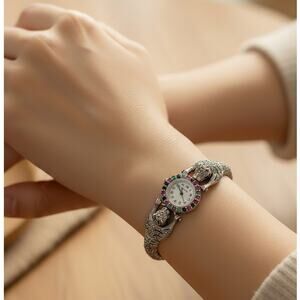 Sterling silver marcasite and gemstone dragon design ladies' quartz watch.